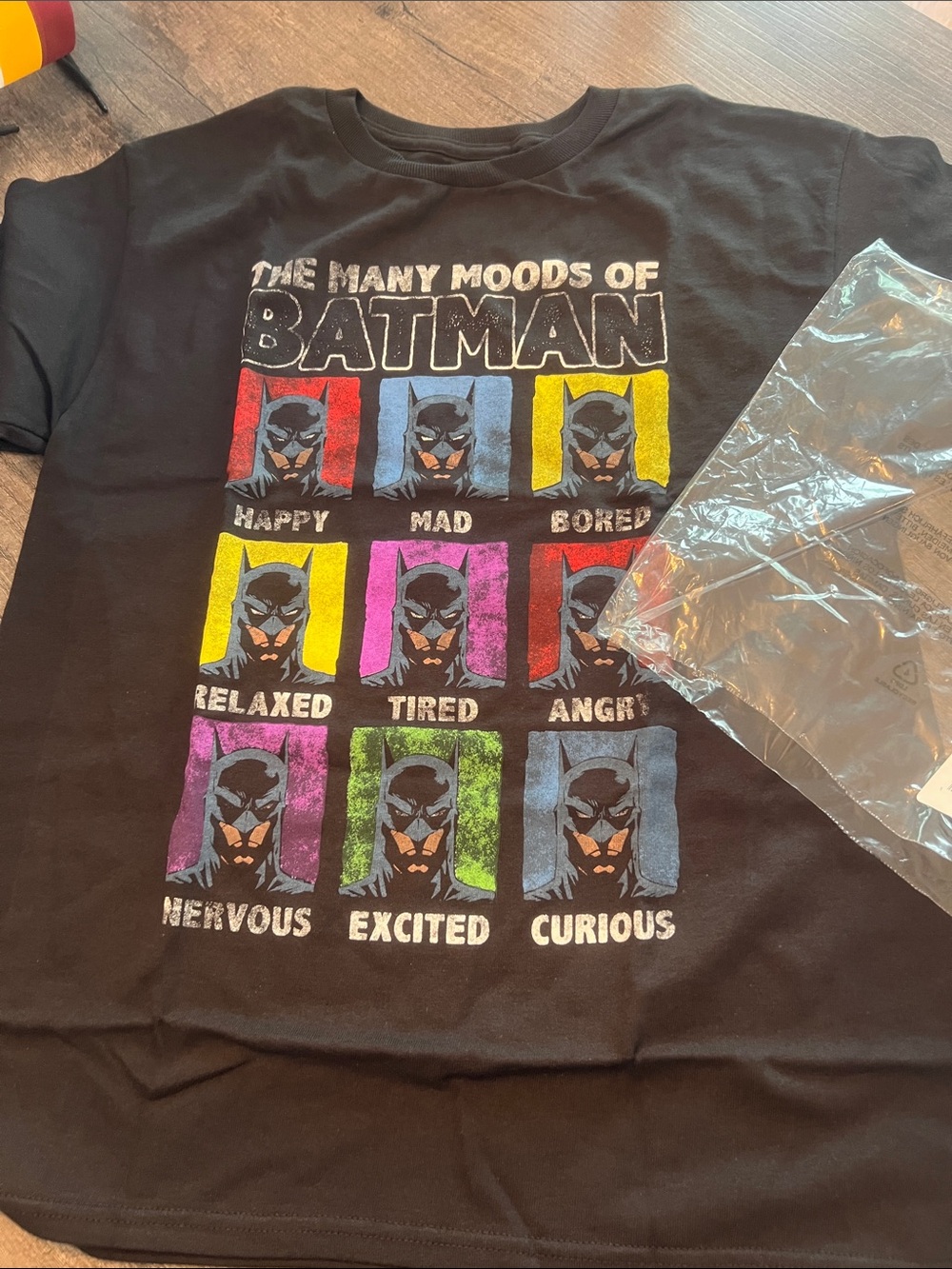 Batman Black Tee with Multicolor 'Many Moods' Graphic